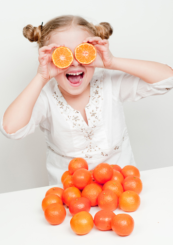 girl with oranges