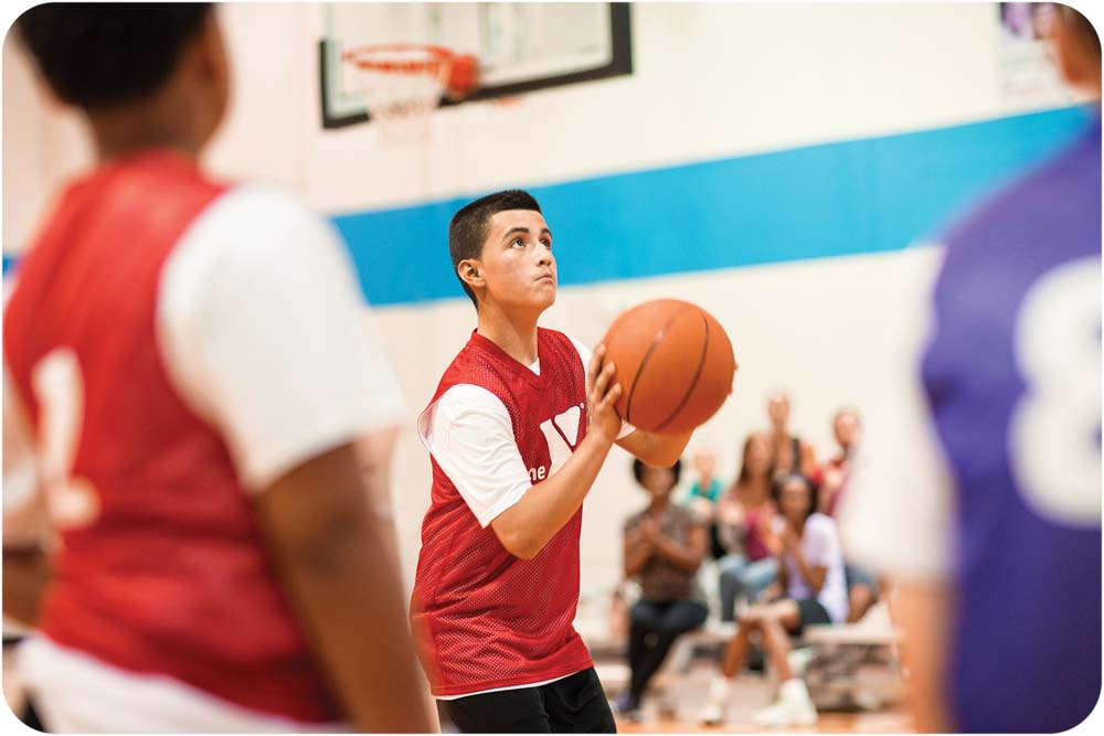 Kid playing basketball 