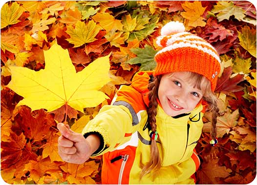 Young Girl Holding a Leaf 