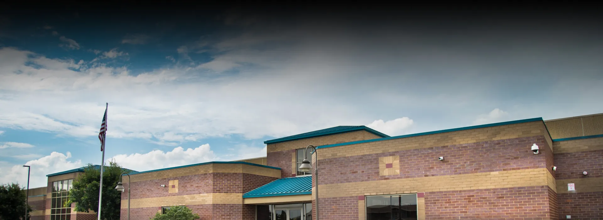 Exterior of the Coffman YMCA on a beautiful sunny day in Springboro, Ohio