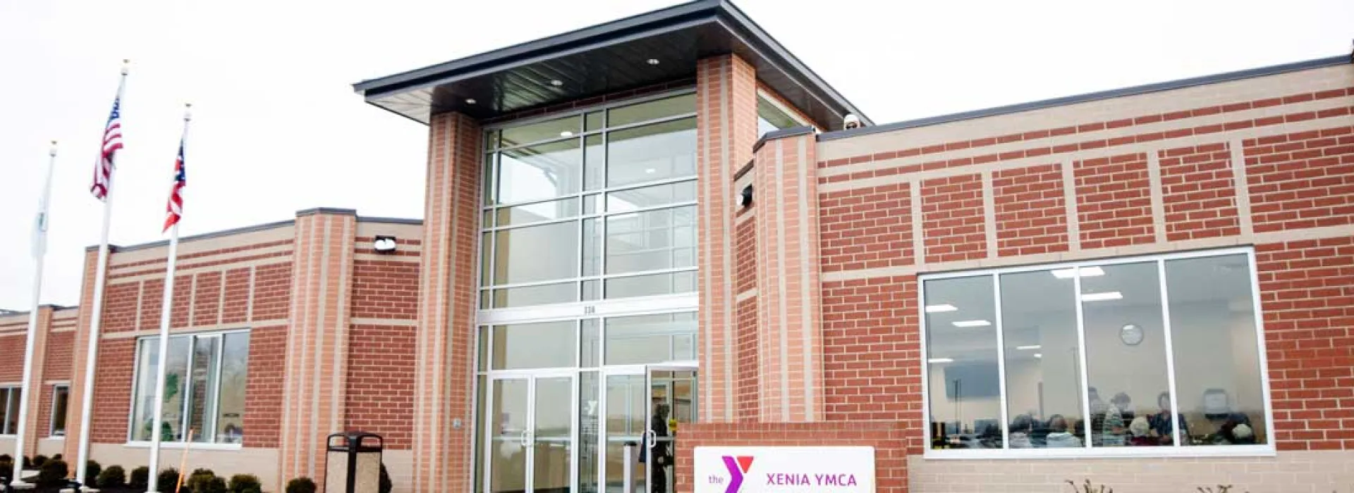 Outside of the new Xenia YMCA building looking at the front entrance during a winter day