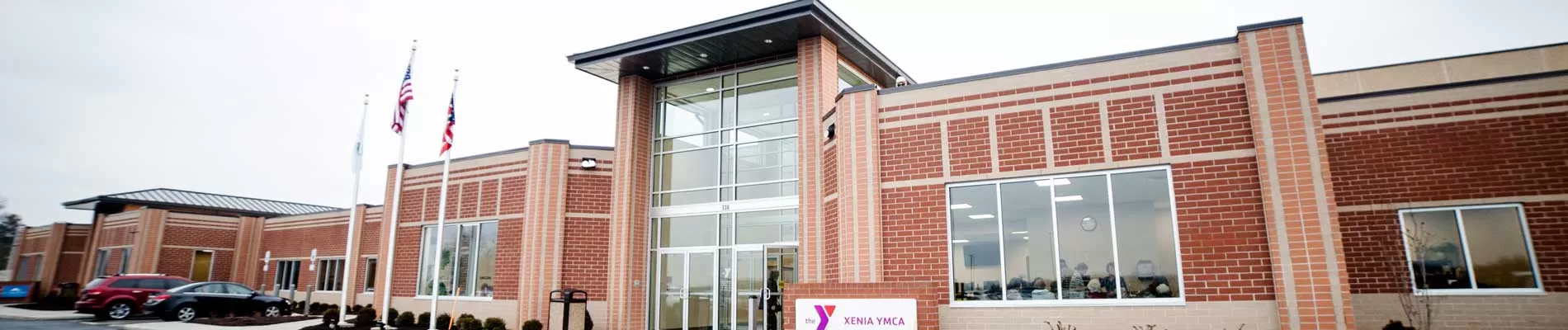 Outside of the new Xenia YMCA building looking at the front entrance during a winter day