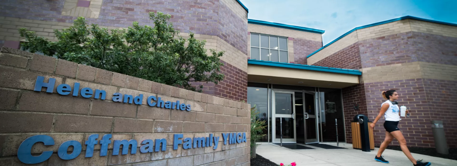 Close up of the outside of the Coffman YMCA building showing the names of Helen and Charles Coffman