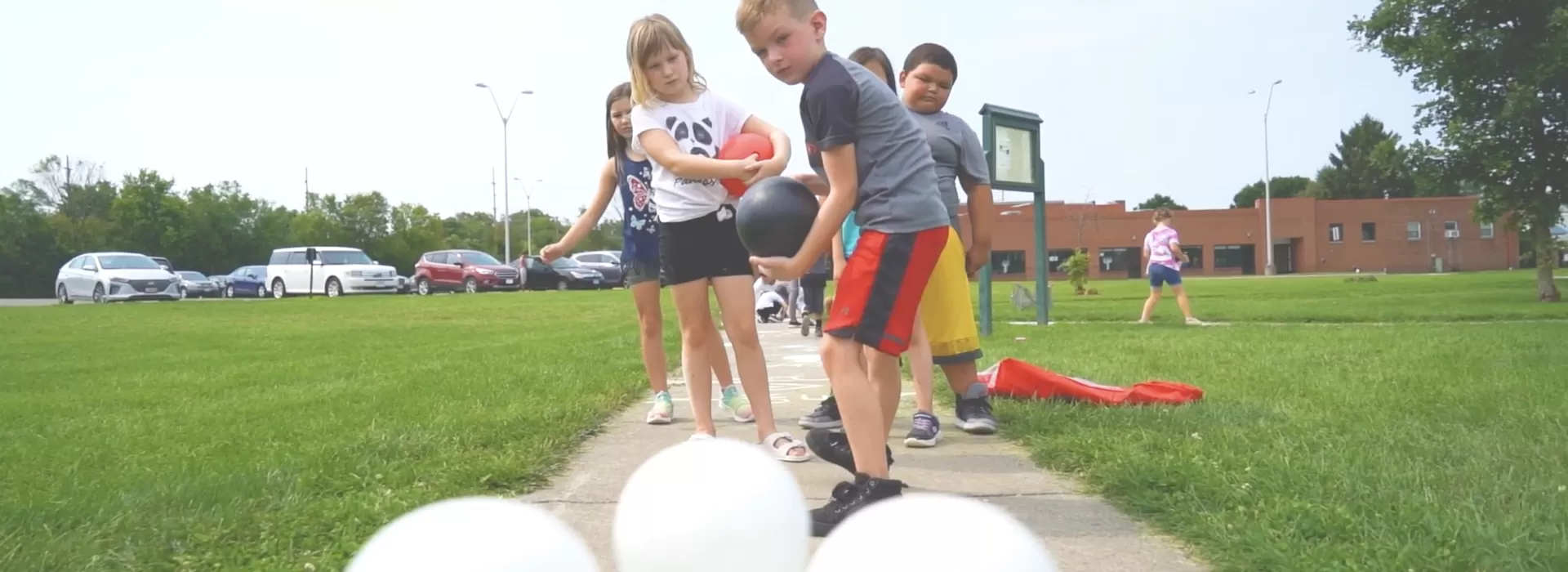 Kids at Y on the Fly Outdoor Bowling
