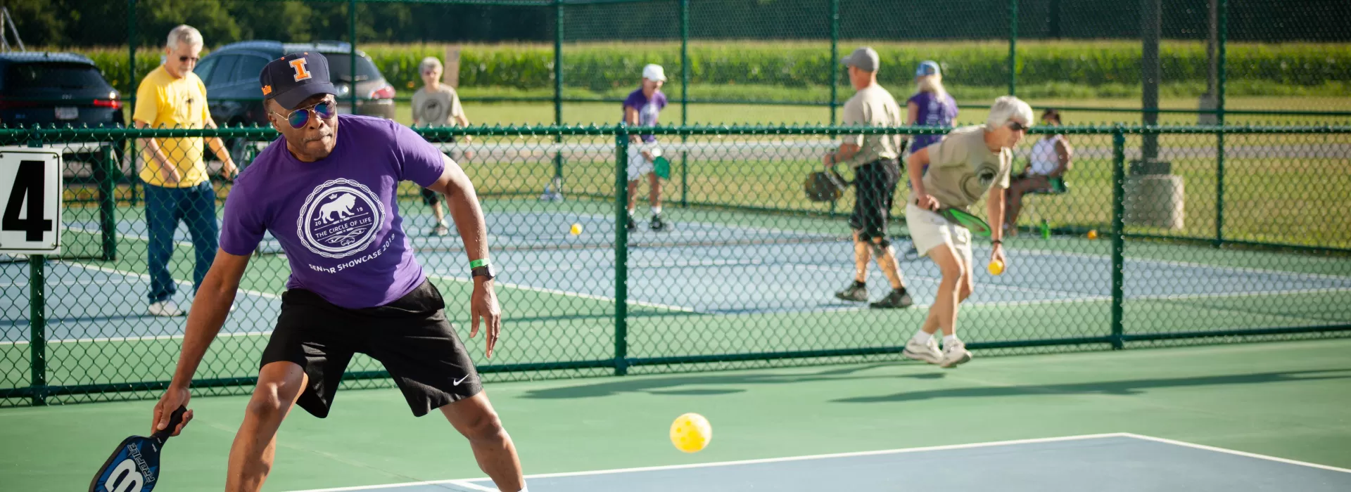 Senior playing pickle ball